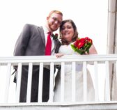 Newly weds looking down from a balcony at OldeSquare Inn Mount Joy PA